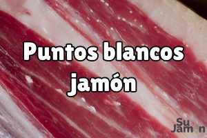 Puntitos blancos del jamón ibérico: qué son y cómo afectan a tu jamón
